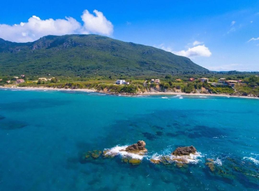 Tetraktys Estate Beachside Υδωρ Agios Matthaios  Екстер'єр фото